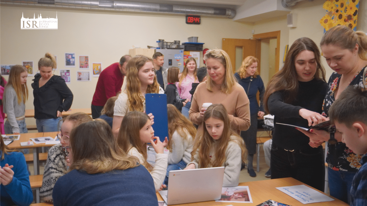 students and parents participate in the PYP Exhibition introduction